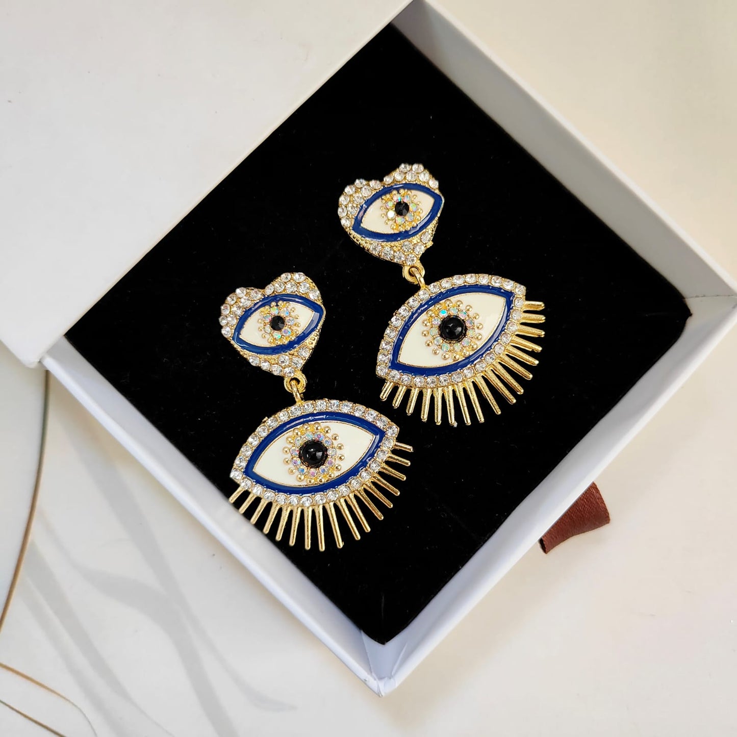 EVIL EYE STATEMENT EARRING